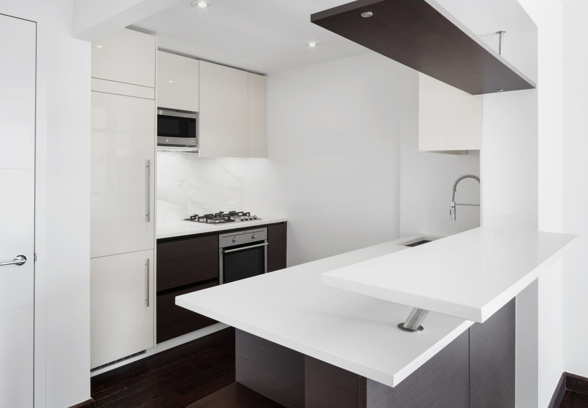 The Nathaniel Kitchen with White cabinets and counter tops.