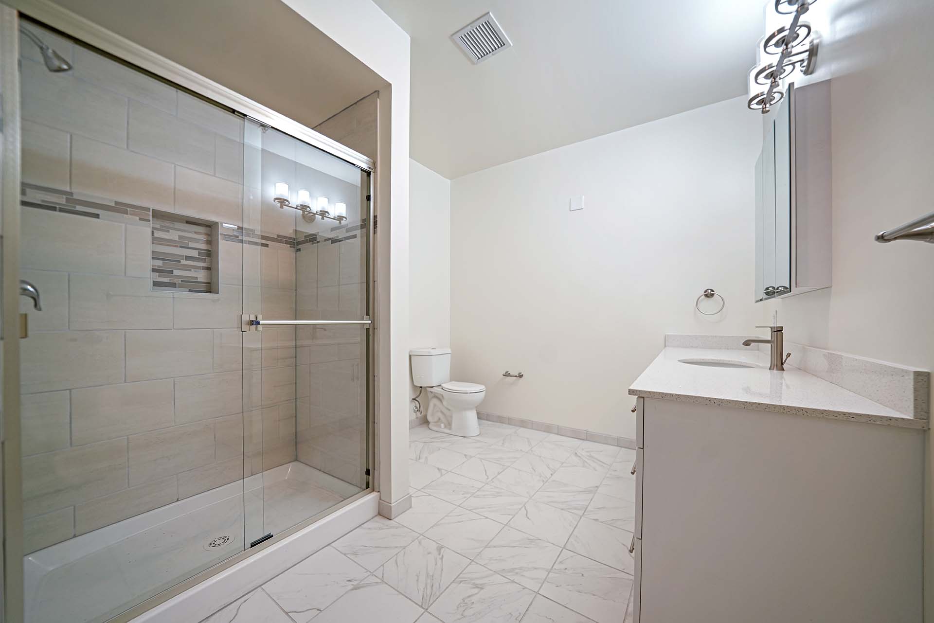 901 Market Tower interior apartment bathroom with stall shower