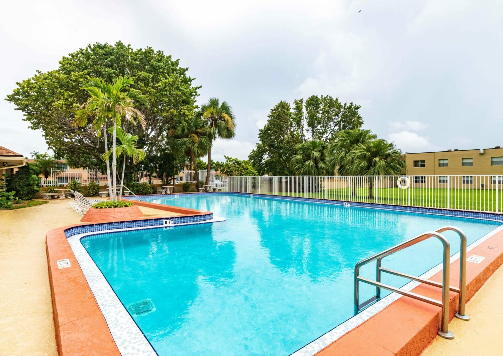 Fenced-in pool area at Green Briar West in Miami, FL.