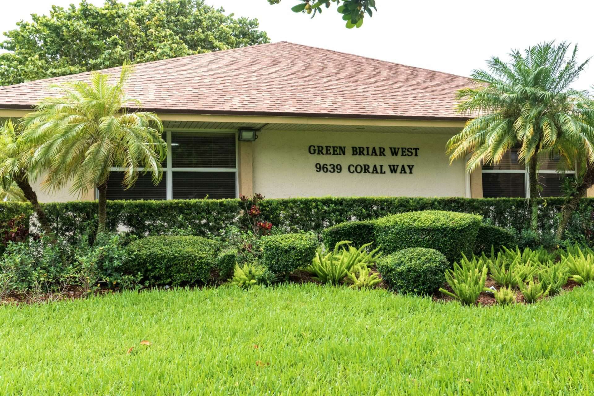 Exterior of Green Briar West leasing office in Miami, Florida.