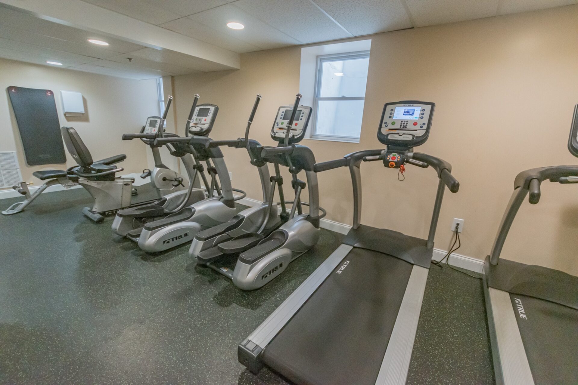 Suburban Court fitness center with workout equipment