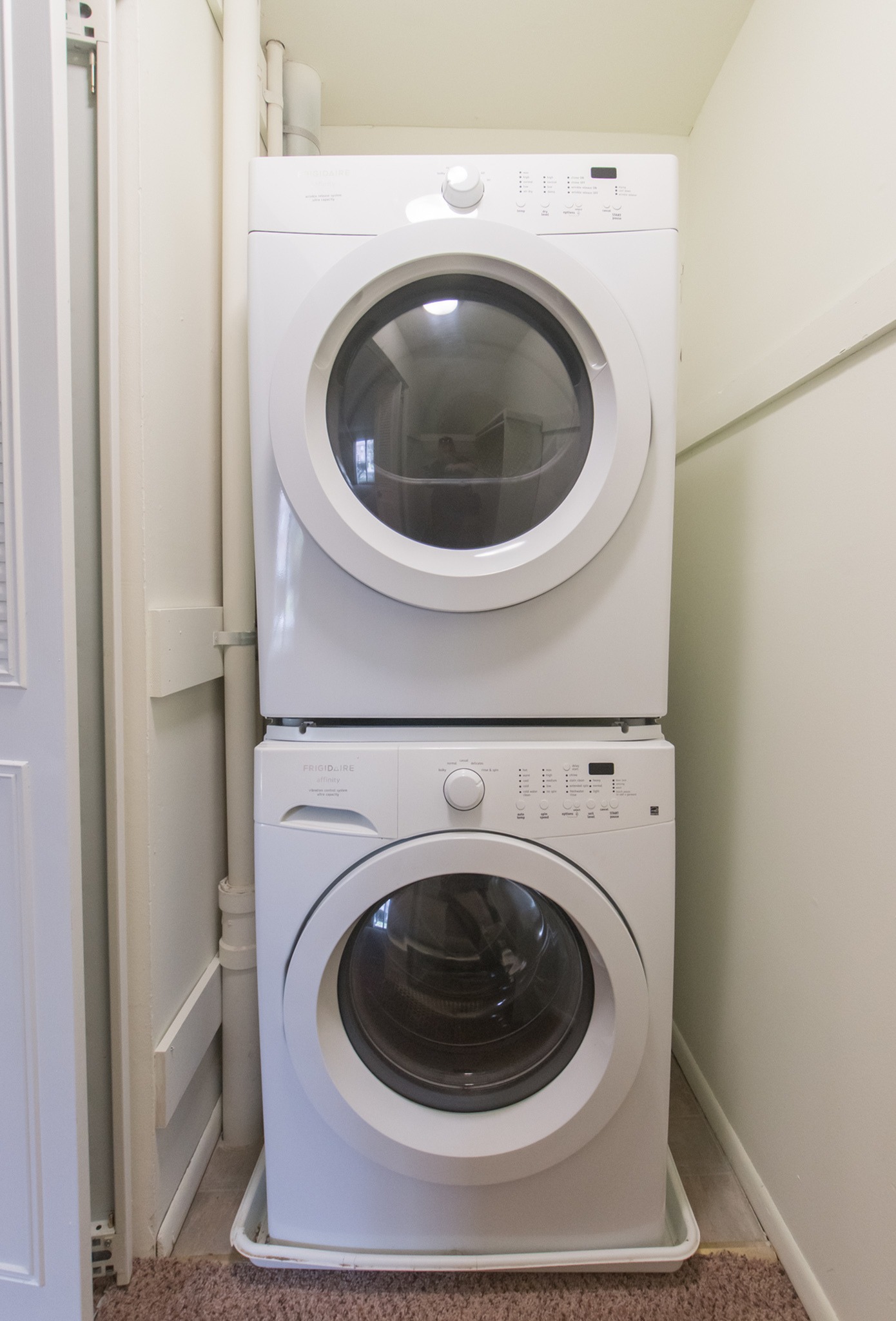 Stackable washer and dryer in an apartment at Independence Crossing.