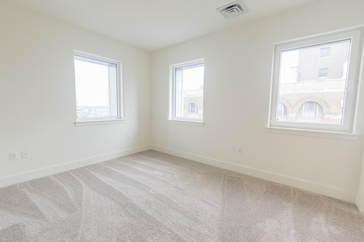 901 Market Tower interior apartment bedroom with carpeting
