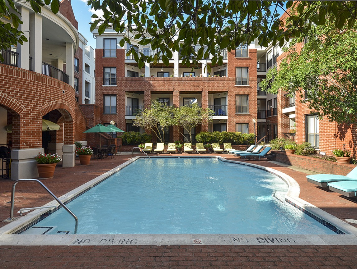 Large long pool in center of courtyard at Waterloo Place Apartments