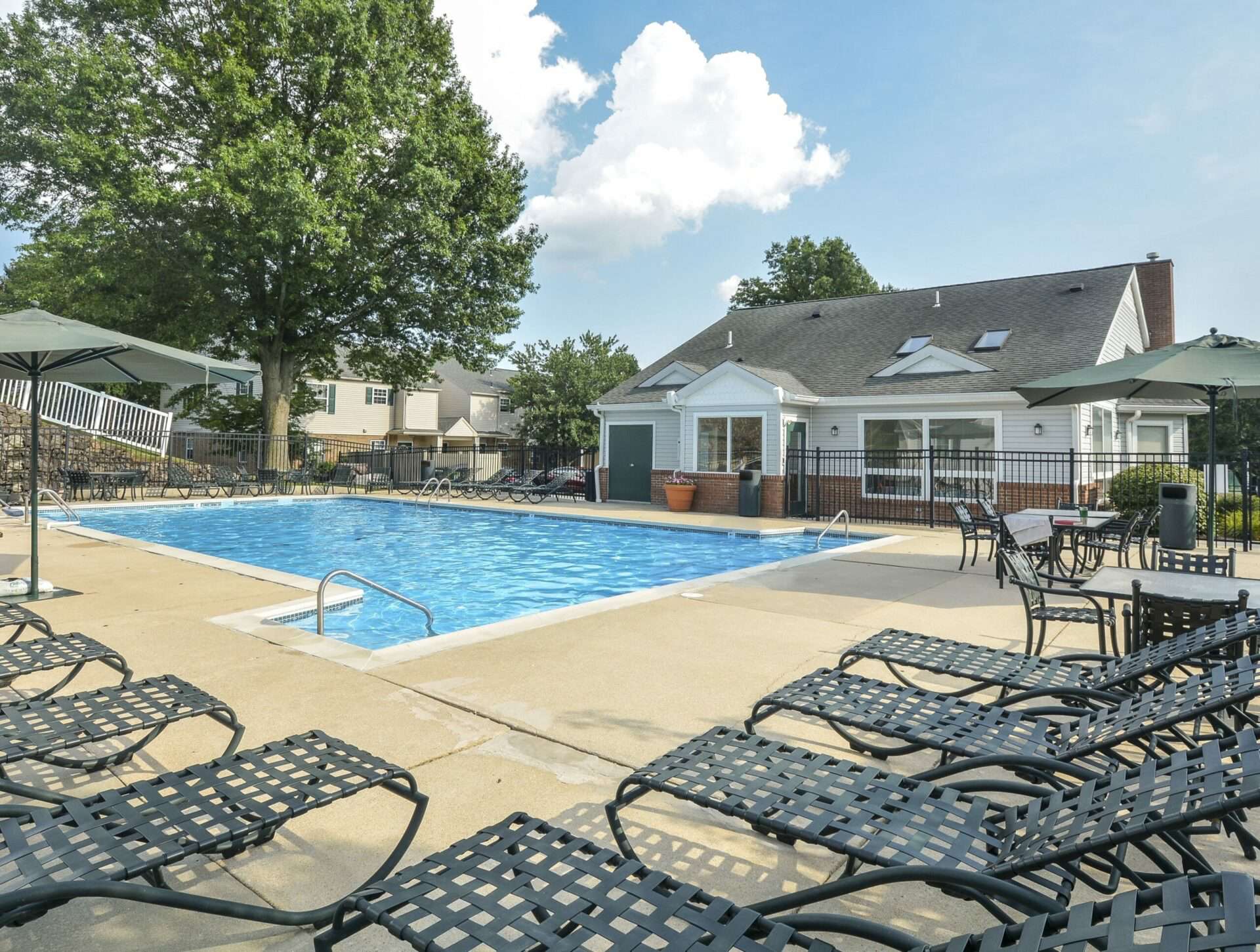 Wyntre Brooke Apartments dazzling pool with loungers