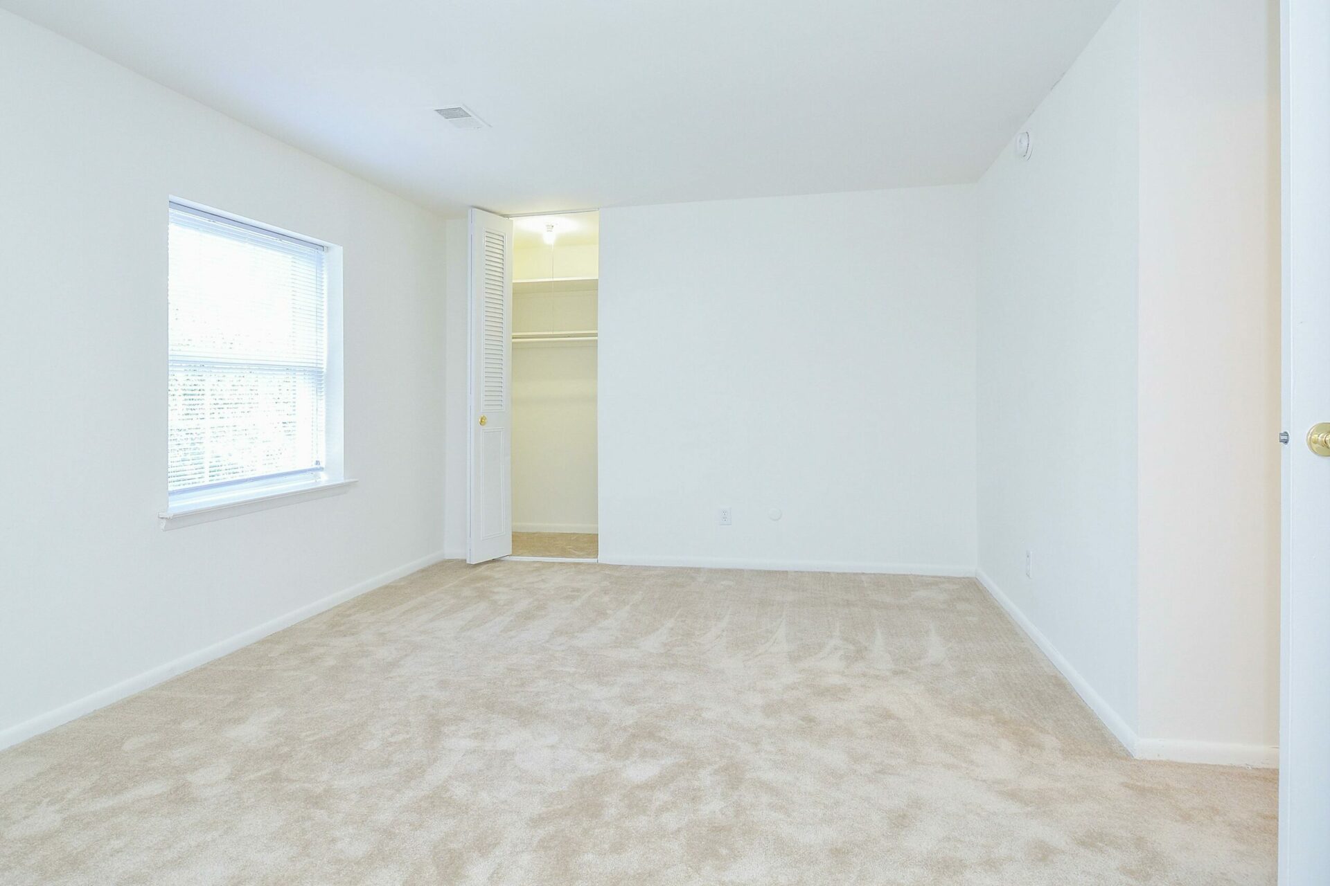 Westover Village bedroom with closet and carpeting
