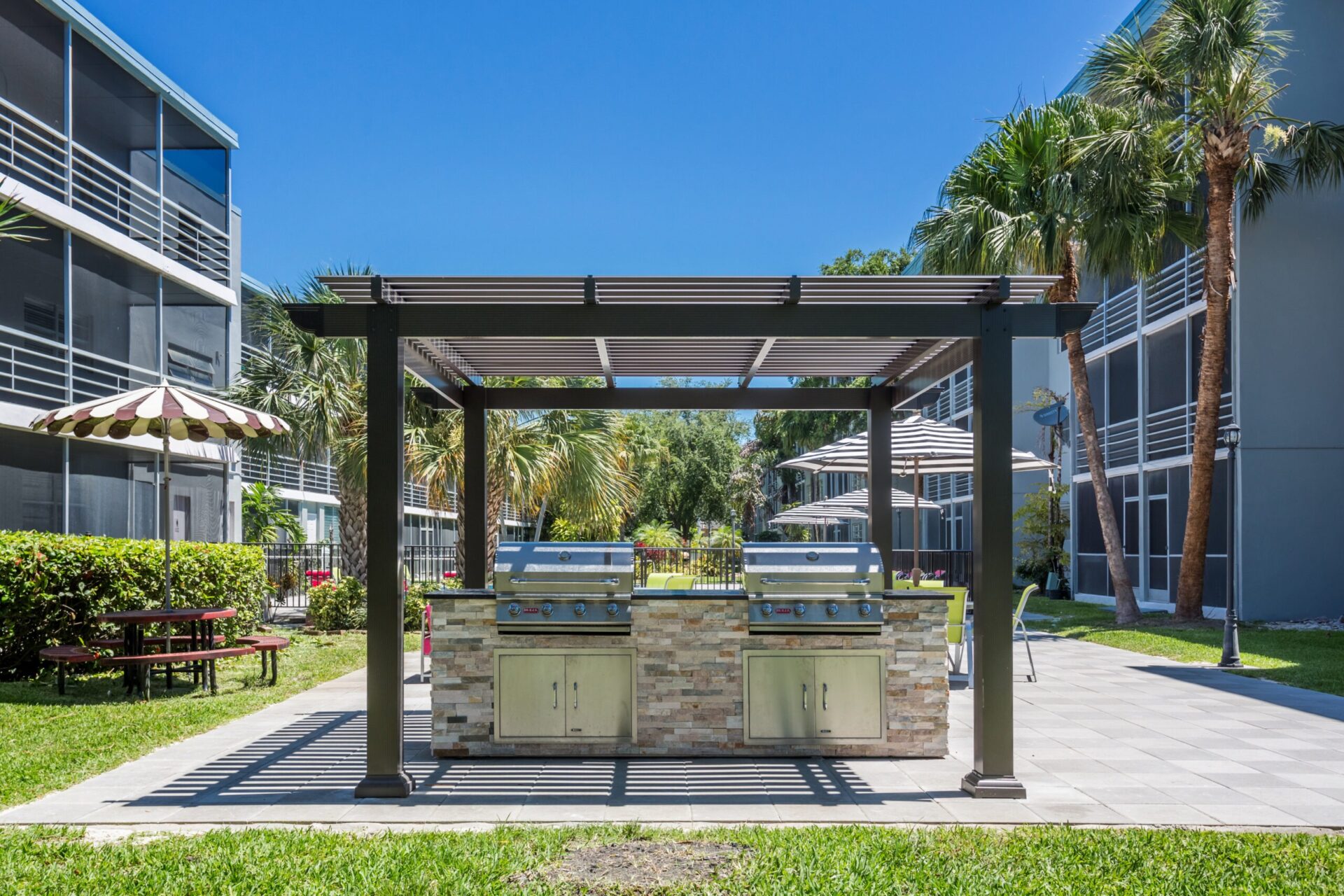 Aventura Oaks grilling station with two grills.