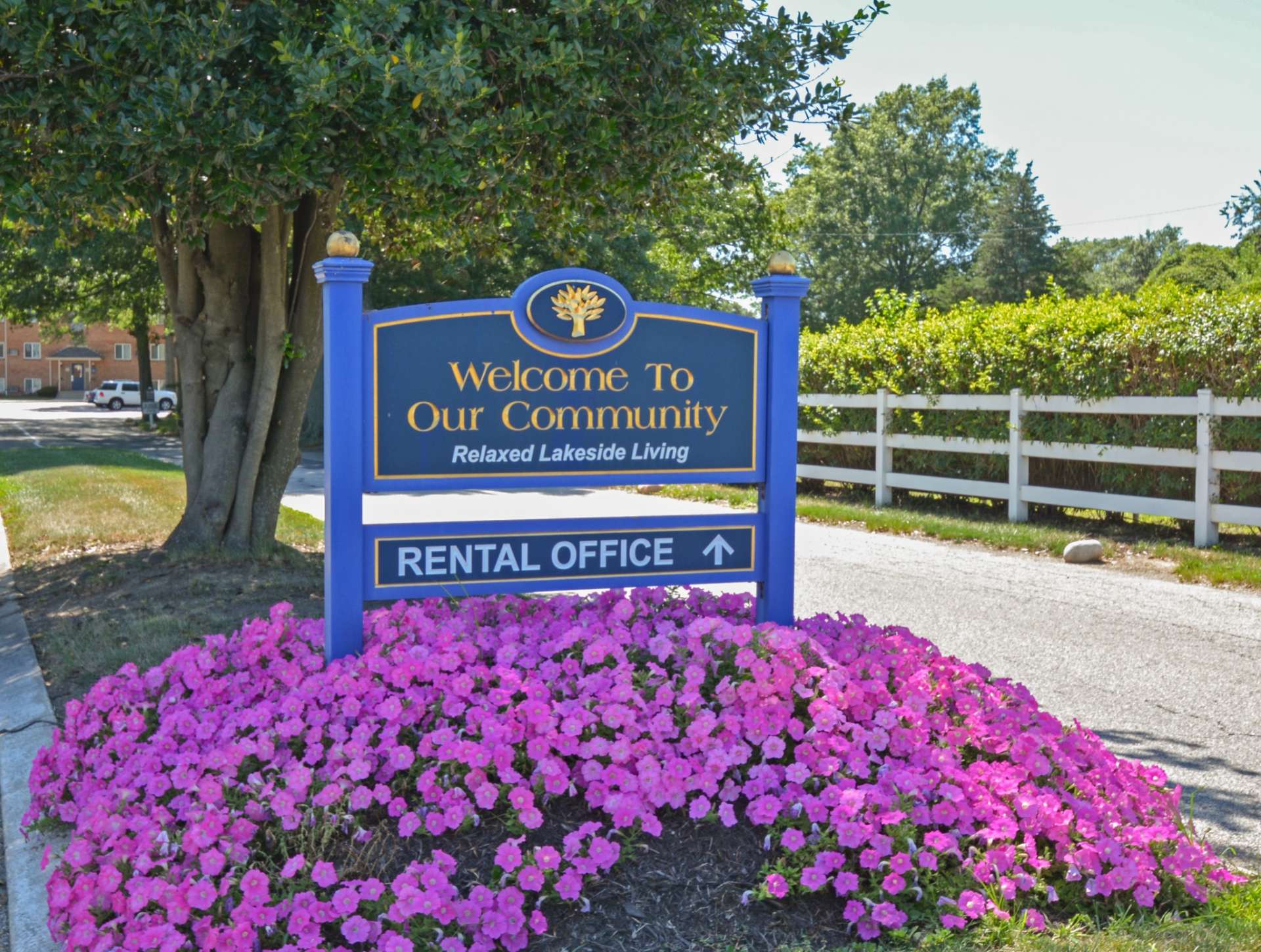 Welcome sign at Lake Club Apartments.
