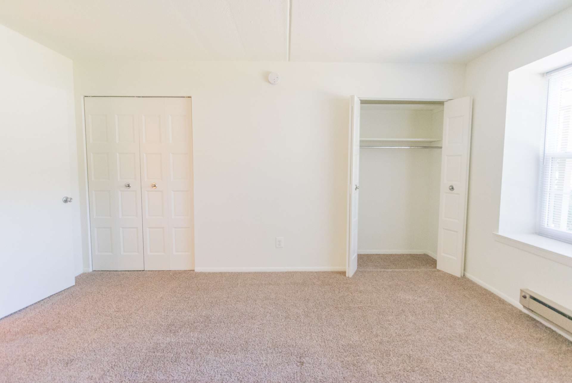 Willow Run Apartments carpeted area with two closets