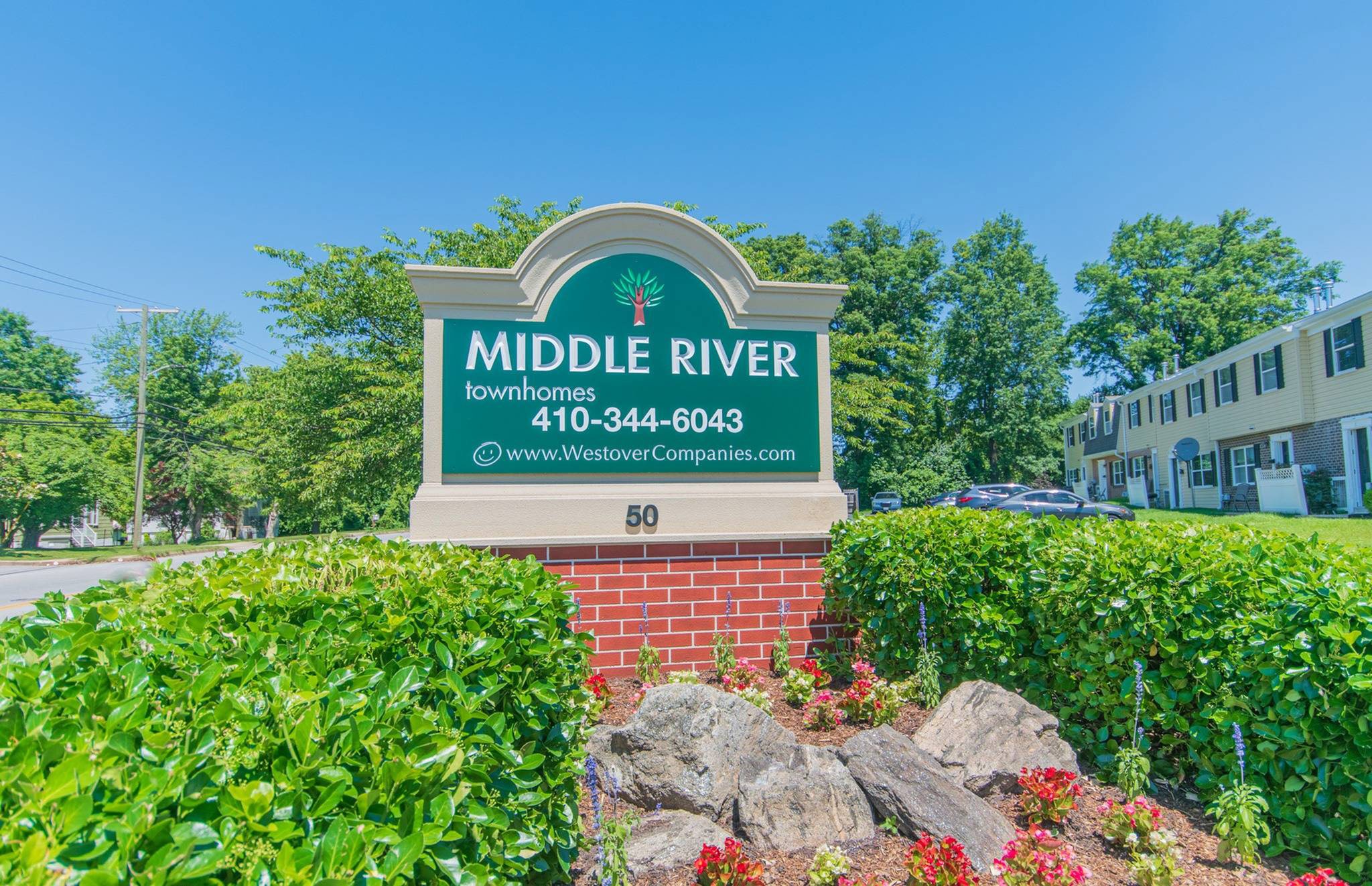 Middle River Townhomes welcome sign.