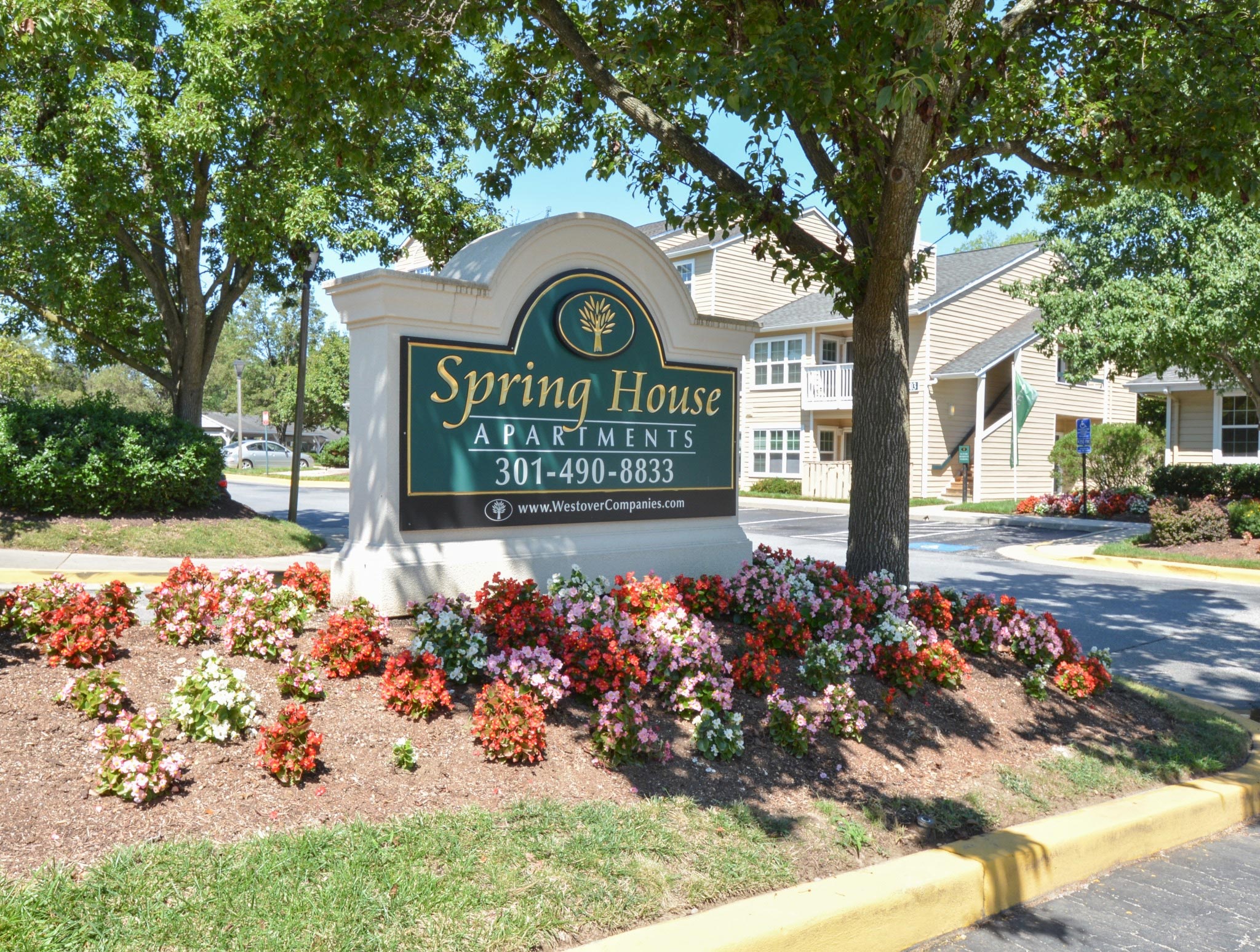 Spring House Apartments welcome sign