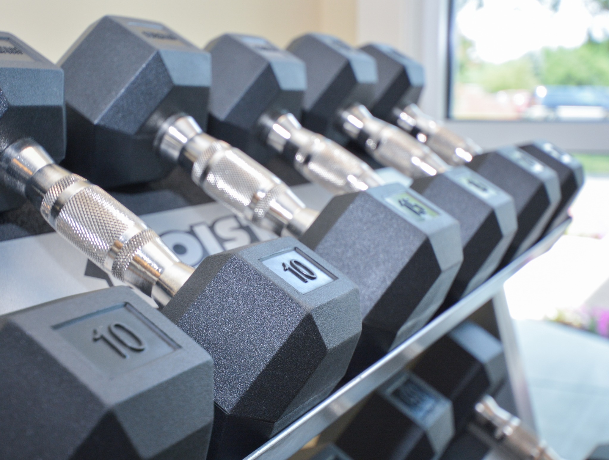 Fitness center area of our community, fitted with dumbells