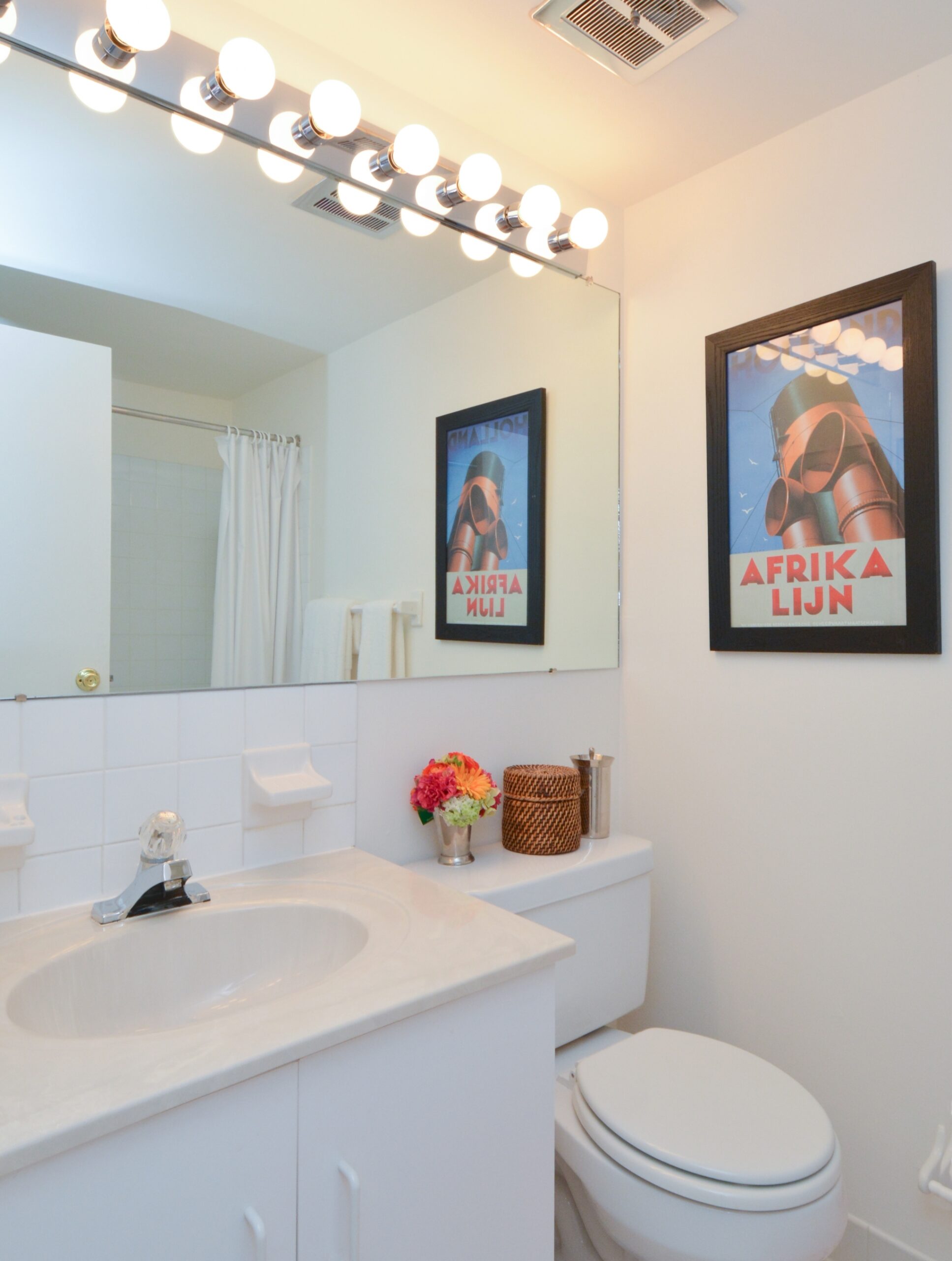 A white vanity in a bathroom at Valley Stream Apartments