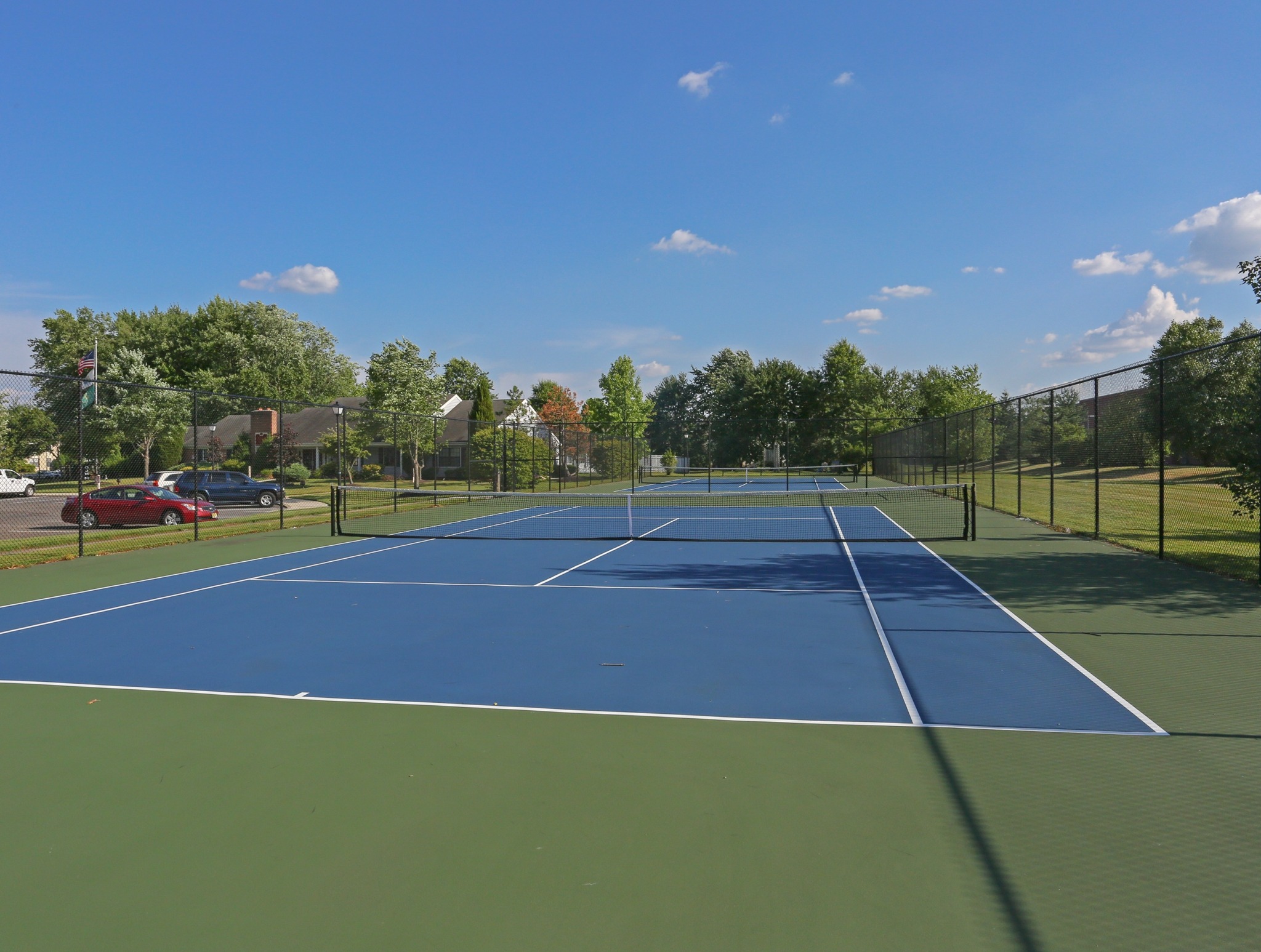 Willow Ridge Village tennis court with parking lot