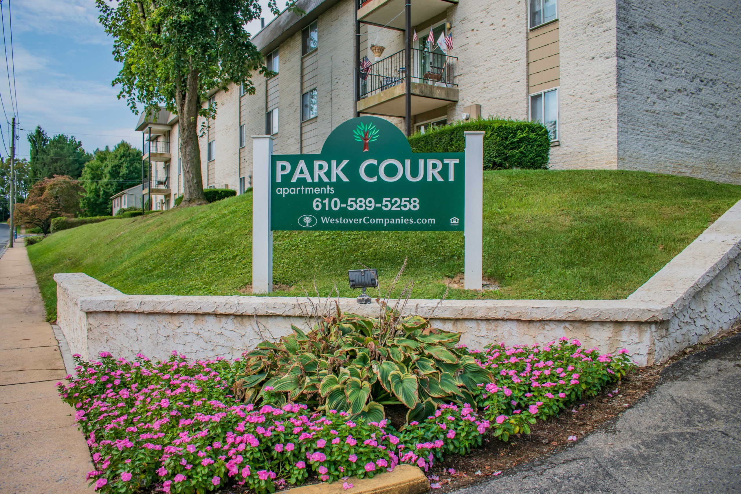 Park Court Apartments signage in front of the property