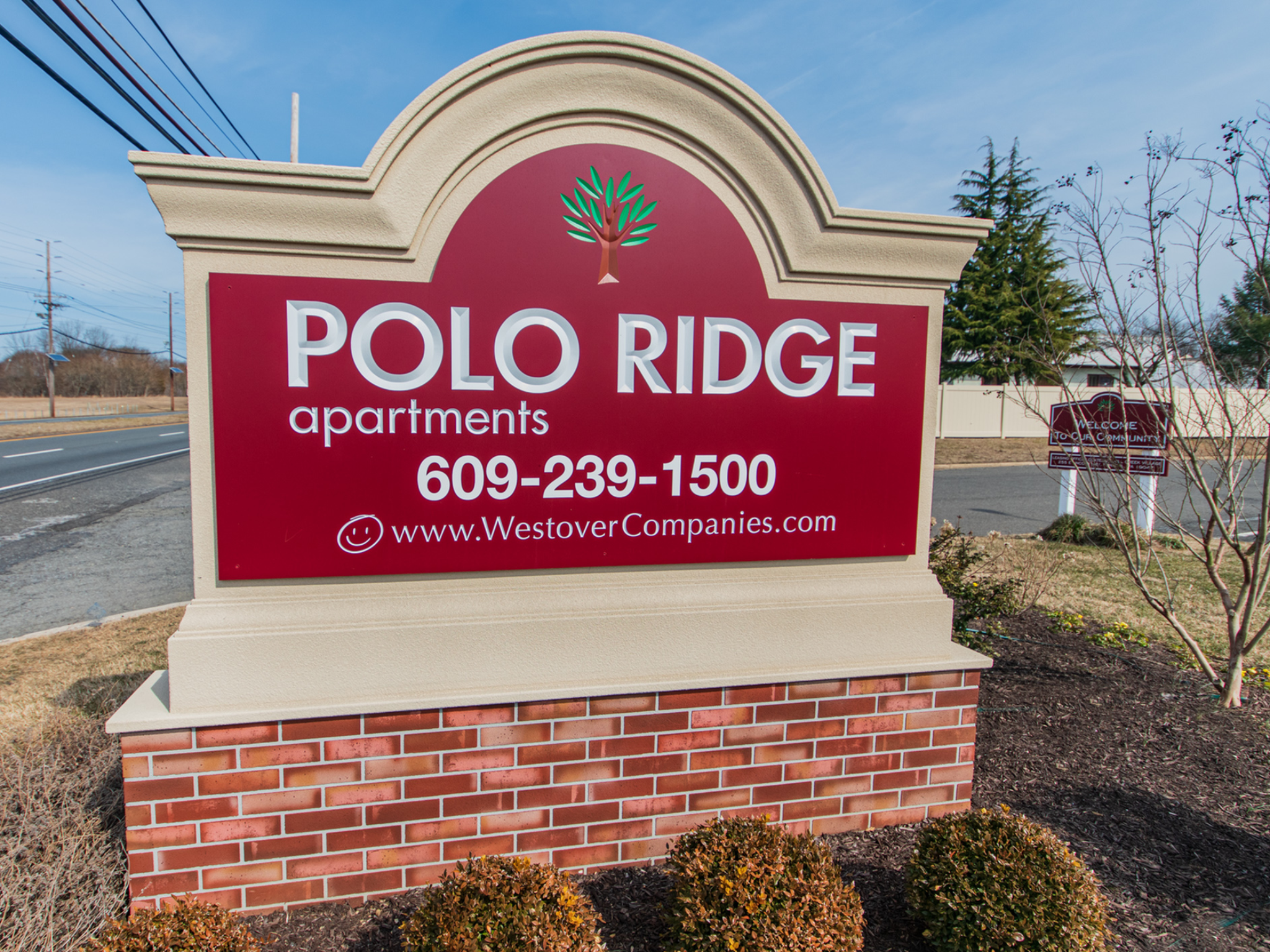 Polo Ridge Apartments exterior signage.
