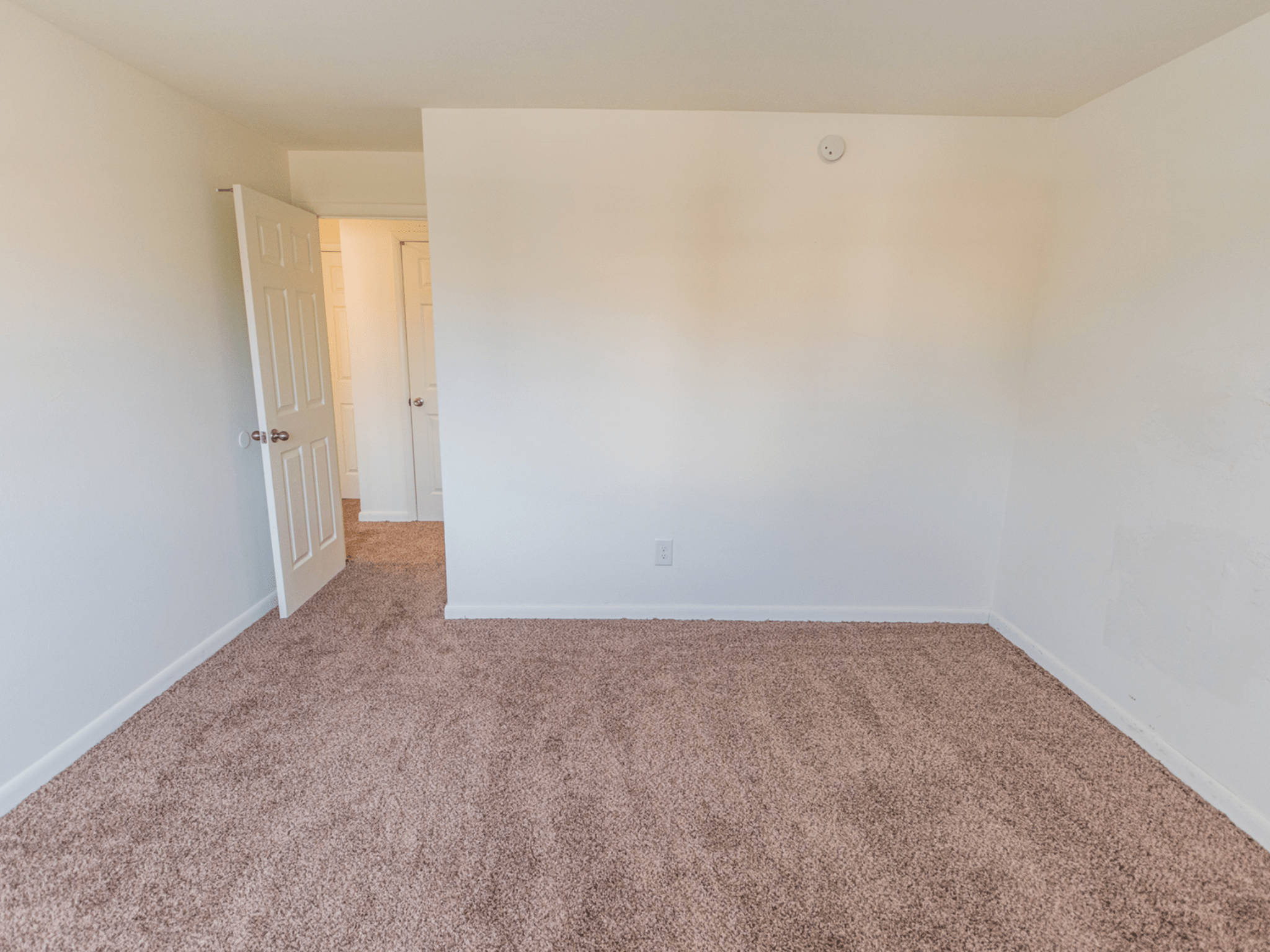 Polo Ridge Apartments carpeted bedroom