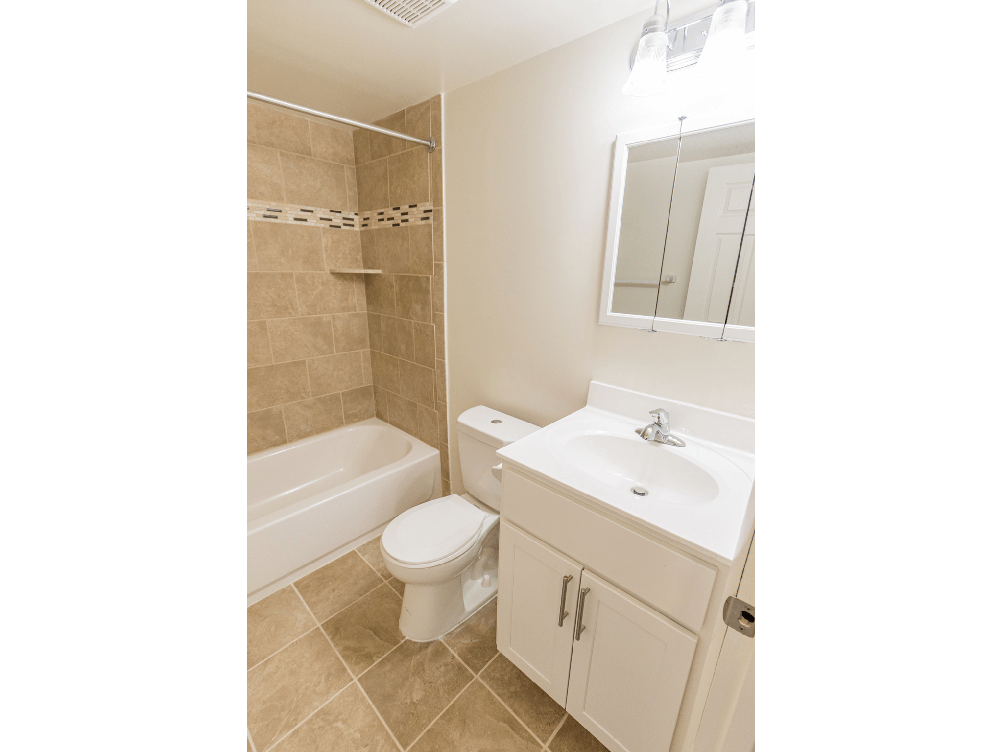 Polo Ridge vanity in large bathroom with tub and shower