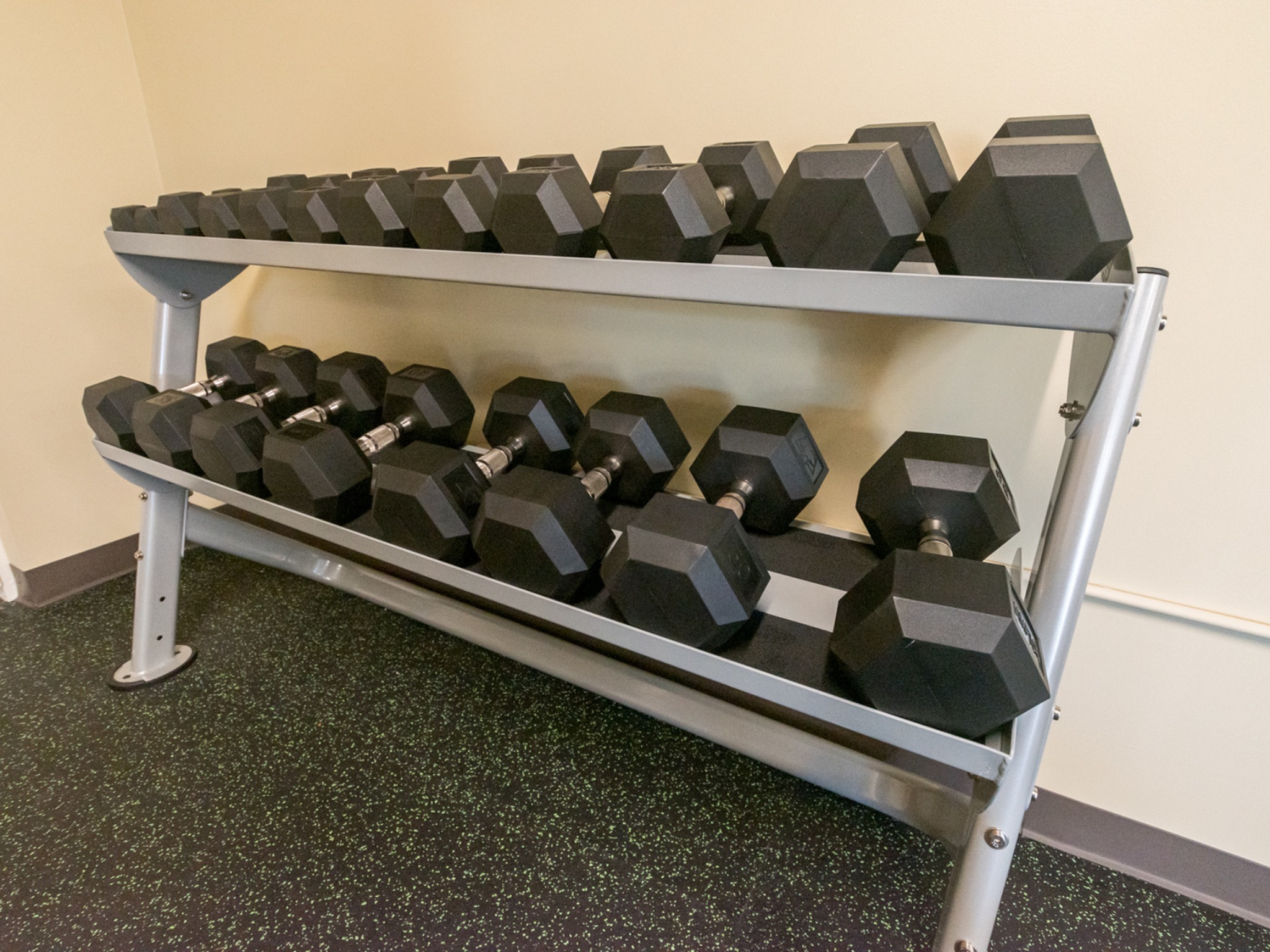 Fitness center area of our community, fitted with dumbells
