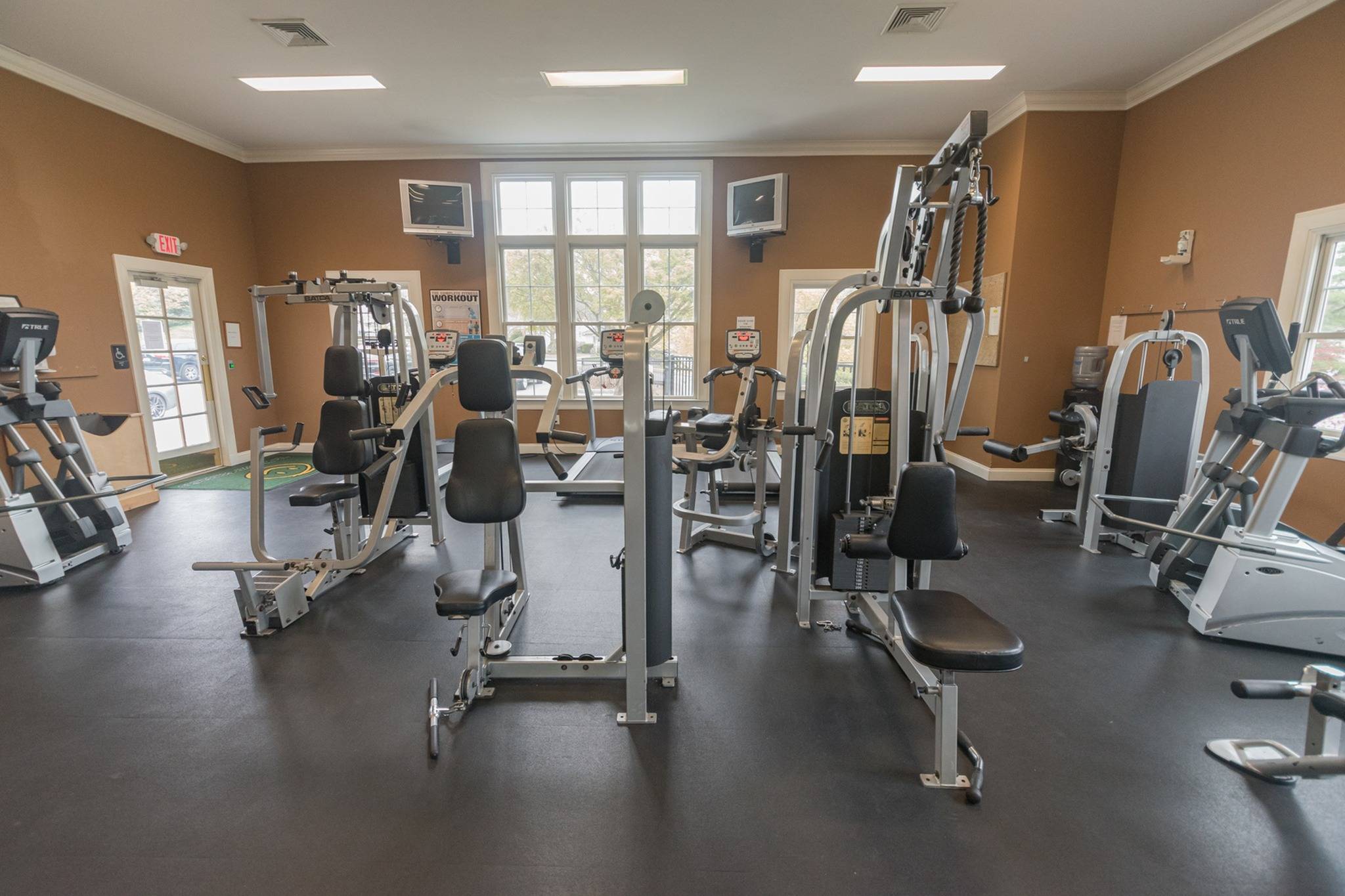 Various workout equipment in an indoor gym.