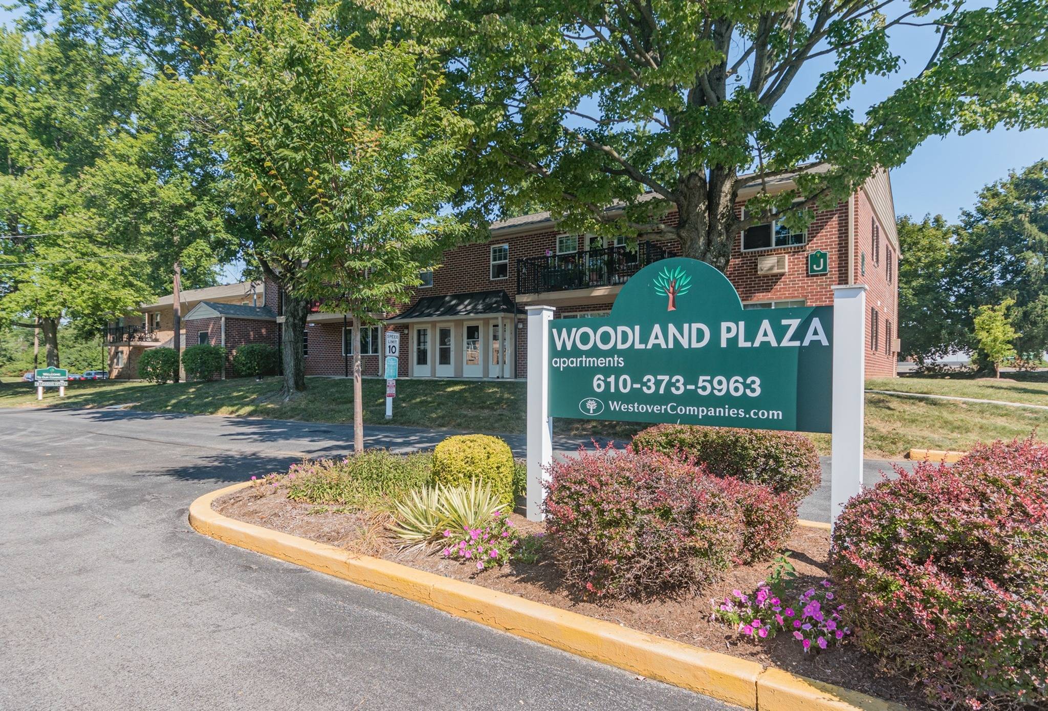 Woodland Plaza signage at the entrance