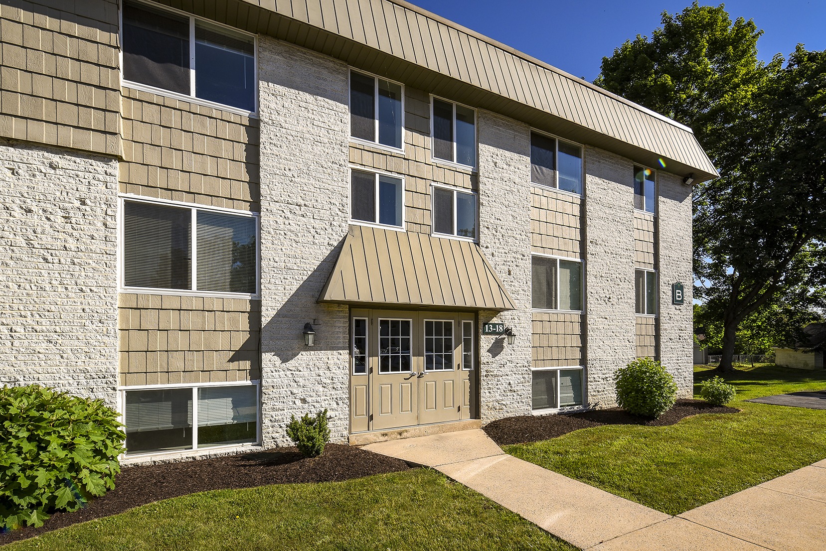 Outdoor view of the front of Park Court apartments in Womelsdorf, PA